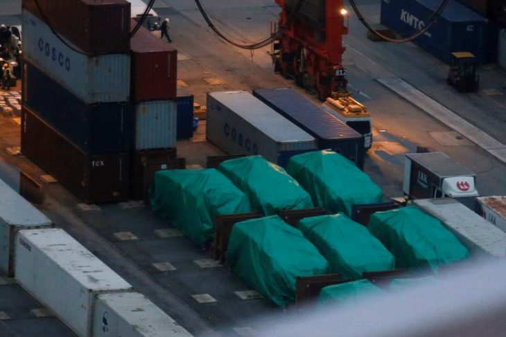 Beijing warns against Taiwan ties as Singapore tries to free troop carriers in Hong Kong