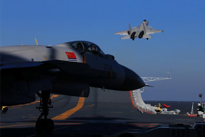 China holds first live-fire drills with aircraft carrier, warships