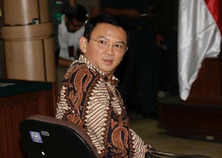 Indonesia transfixed as tearful Jakarta governor appears at blasphemy trial