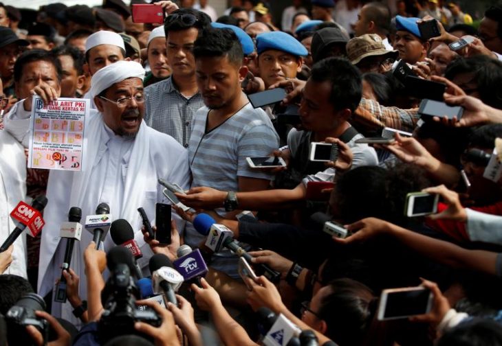 Indonesia names Islamist leader a suspect for insulting state ideology