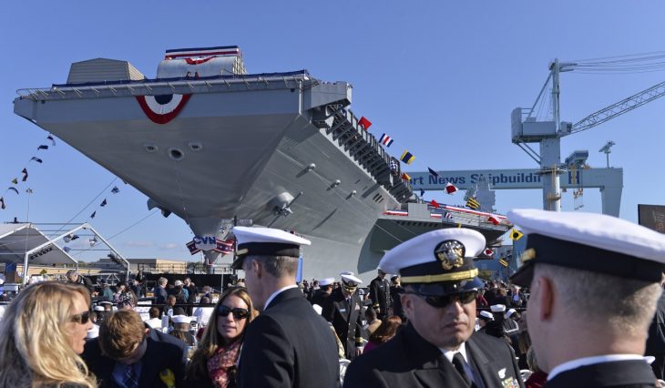 US Navy takes delivery of new US$12.9 billion aircraft carrier, target of Trump criticism PUBLISHED : Friday, 02 June, 2017, 10:10am UPDATED : Friday, 02 June, 2017, 10:10am COMMENTS:     Associated Press Associated Press 6SHARE  PrintEmail The first of a new class of aircraft carriers has been officially delivered to the US Navy after more than a year of delays, cost overruns and technological glitches that drew criticism from President Donald Trump. SCMP TODAY: INTL EDITION Get updates direct to your inbox E-mail * Enter your email  subscribe By registering you agree to our T&Cs & Privacy Policy The Navy said Thursday that the USS Gerald R. Ford will now go through various workups at sea before becoming operational in 2020. The Navy plans to build at least two more Ford-Class carriers, according to the Congressional Research Service. The Navy says the technologically superior Ford can carry more planes and operate with several hundred fewer sailors. A new electromagnetic system for launching aircraft will help to increase flying missions by a third. But the delivery of the new carrier by Newport News Shipbuilding in Virginia follows Trump’s complaints about the ship’s new catapult launch system, which uses previously untested technology. The president told Time magazine last month that the Navy should go back to using steam catapults because the new system “costs hundreds of millions of dollars more money and it’s no good.” China launches first home-built aircraft carrier  Navy Lieutenant Kara Yingling, a spokeswoman at the Pentagon, said on Thursday that the Navy has no comment regarding Trump’s statements. President Donald Trump speaks to Navy and shipyard personnel aboard the aircraft carrier Gerald R. Ford at Newport News Shipbuilding in Newport News, Virginia, on March 2. Photo: Washington Post / Jabin Botsford Acting Navy Secretary Sean Stackley told the US Naval Institute News last month that “we have not briefed the president on the Ford program. He did go down to Newport News and visited the ship, was onboard the ship. And so I wasn’t present for that visit, I don’t know what his source of information was.” The catapult initially failed during a demonstration in 2015, according to media reports. Testing also showed that the catapult put too much stress on planes carrying the extra weight of external fuel tanks, according to a Department of Defence report. The Navy’s press release announcing the ship’s delivery stated that “any deficiencies identified during trials will be addressed” when the Ford is in port. Navy spokesman William Couch said he couldn’t comment on the status of the ship’s operating systems. Guests attend the christening ceremony of USS Gerald R. Ford in November 2013. Photo: Xinhua “Right now we’re in that period where the ship is no longer under construction,” he said. “This is where the ship begins on the path to becoming an operational unit.” Much of the delays and cost overruns have been attributed to the Ford’s incorporation of several new systems at once. They include the new catapult system as well as new technology for landing planes, which has also had problems. Construction of the Ford was supposed to finish by September 2015. The US$12.9 billion ship was initially supposed to cost US$10.5 billion. Christie Miller, a spokeswoman for shipyard-owner Huntington Ingalls Industries, said it’s already building the second Ford-class carrier, the John F. Kennedy. The shipyard has also received an advanced planning contract for a third carrier, the USS Enterprise.