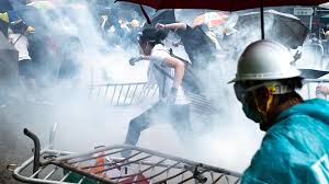 A day of unprecedented violence in Hong Kong as protesters storm the Legislative Council and police fire tear gas