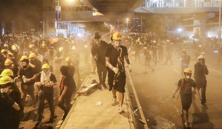 Hong Kong plunged into commuter chaos as protesters block roads