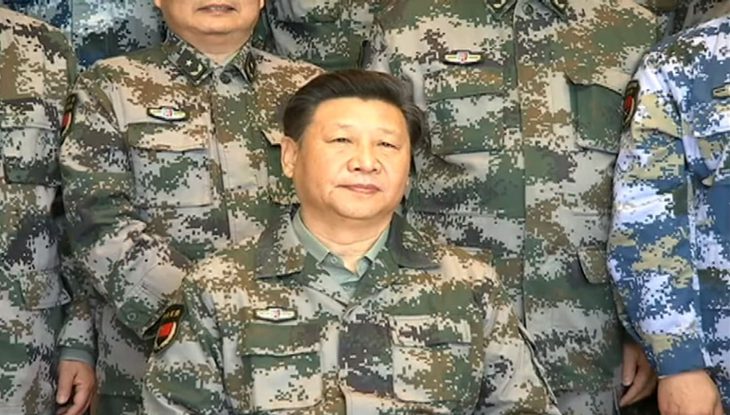 In the time of global turmoil, Xi stresses enhancing political loyalty in military
