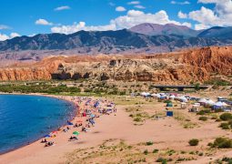 Red sands beach at Unique Lake Issyk-Kul’s