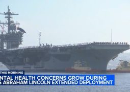 USS Abraham Lincoln sails past Singapore on its way home from Middle East