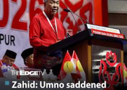 Malaysia elections: Zahid allows Najib supporter onto stage with ‘Justice for Najib’ placard